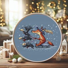 a cross stitch pattern with an image of a dog sledding