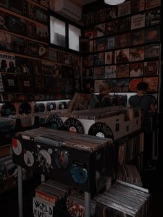 a room filled with lots of records and cds