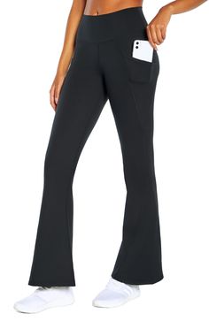 PRICES MAY VARY. High-rise flared pant with 4" waistband for full coverage, tummy control, and slimming compression. Contender Luxe is fit for ultimate versatility and everyday comfort. It's a moisture-wicking and double-knit fabric for added coverage, with a brushed finished that makes it soft, smooth and extra cozy. Flared pant legs detail. Full length with a 32" inseam Flare Pant, Flare Leggings, Jogger Shorts, Clothing Line, Long Sleeves Jacket, Pocket Pants, Black White Red, Yoga Women, Sports Bras