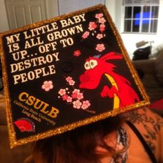 a woman wearing a graduation cap that reads, my little baby is all grown up and down destroy to people