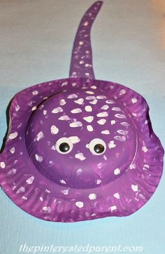 a purple paper plate shaped like an octopus