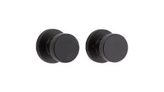 two black door knobs on a white background