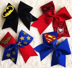 four bows with different designs on them, one is red and the other is blue