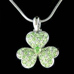 PERFECT GIFT FOR ST. PATRICK'S DAY!!!You are getting a three-leaves CLOVER Pendant with Swarovski crystals come with a FREE 18" inches silver (45cm) rhodium finish necklace with lobster clasp, inlayed with a lot of Swarovski Crystals. Pendant size: is 3/4" wide X 1" high (20mm X 25mm).Crystal Color: Peridot===================Prices are in US$.For shipping policies and other important information, click on “profile” on the right.See an item that you like but has already been sold? Contact me to s Rhinestone Jewelry Christmas Gift, Christmas Gift Rhinestone Jewelry, Green Rhinestone Jewelry For Gift, Christmas Gift Jewelry With Rhinestones, Green Rhinestone Necklace For Gift, Green Necklaces With Rhinestones As Gift, Brooch Diamond, Three Leaf Clover, Clover Pendant