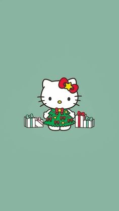 hello kitty holding a christmas tree with presents in front of it on a green background