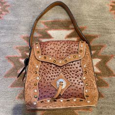 Nwot Montana Silversmith Leather Purse No Flaws! Message For More Photos Brown Pouch Bags With Snap Closure, Brown Hand-tooled Shoulder Bag, Hand-tooled Saddle Bags, Leather Purse, Tan Brown, Leather Purses, More Photos, Montana, Shoulder Bags