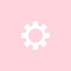 a pink background with a white cogwheel on it