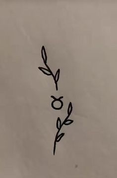 a black and white drawing of a plant on a sheet of paper with the word love written in it