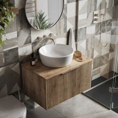 a bathroom with a sink, mirror and shower in it's centerpieces