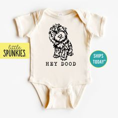 Boho Funny Baby Bodysuit, Hey Dood Natural Onesies® Brand, Golden Doodle Infant Tshirt PRODUCTION TIME Little Spunkies from the designer/owner of Spunky Pineapple Co https://www.etsy.com/shop/SpunkyPineappleCo   All baby and toddler clothes are 100% designed and printed with water based ink. All orders placed before 12:00 pm EST are shipped out same day (Monday - Friday). Orders received after noon are shipped out the next business day. ONESIES® BRAND Made from 100% Cotton. We print on Onesies® Brand. T-SHIRT Made from 100% Cotton. These run true to size. If you are in between sizes we suggest sizing up. CARE Machine wash in cold water, inside out, and tumble dry.   SHIPPING All orders are shipped out via USPS First Class Mail (3-4 days).   Shipping upgrades are available at checkout: *USP Cotton Onesie With Graphic Print For Playtime, Cotton Graphic Print Onesie For Playtime, White Short Sleeve Onesie With Character Print, Playful Cotton Onesie With Custom Print, Cute Cotton Onesie With Custom Print, Unisex Cotton Onesie With Character Print, Short Sleeve Cotton Onesie With Cartoon Print, Unisex Graphic Print Onesie For Playtime, Unisex Cute Onesie With Graphic Print