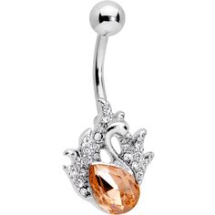 an orange crystal belly ring with white crystals