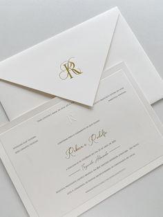 two envelopes with the letter k on them, one has a monogrammed design