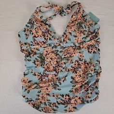 Size: Xl Color: Light Blue, Peach, Green, Red Style: Tankini Swim Top Materials: 82% Nylon 18% Spandex: Lining 100% Polyester Condition: Nwt, No Signs Of Wear Or Damage Halter Style Tankini Top Has Ties Around That Neck And A V Front Neckline. The Sides Have Ruching Near The Bottom. Beautiful Drape To The Fabric For Coverage. Built In Bra Cups And A Seam Under The Bust. W0844 Keyword: Summer Beach Pool Resort Vacation Cruise Travel Island Snorkel Backyard Sprinkler Summer Floral Print Top For Pool, Blue Tops For Pool Occasions In Spring, Blue Floral Print Tankini For Spring, Stretch Floral Print Tops For Poolside, Spring Halter Neck Top For Pool, Halter Neck Top For Spring Pool Party, Light Blue Tops For Poolside In Spring, Spring Floral Print V-neck Tankini, Pool Resort