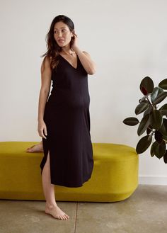 The most easy-to-wear dress ever. You'll love the smooth textured knit, paired with the center-front seam for an elevated everyday look. Add in a flattering deep V and just-right hem slits, and it's made for standing out whether you’re pregnant, postpartum or living the mom life. 87% polyester / 11% rayon / 2% spandex Hand wash cold with like colors. Do not bleach. Lay flat to dry. Iron low heat. Machine wash cold with like colors. Do not bleach. Tumble dry low. Iron low heat. A Now + Forever™ f Stretch V-neck Midi Dress For Daywear, Fitted V-neck Maxi Dress For Loungewear, Stretch V-neck Maxi Dress With Flattering Silhouette, Chic Dresses For Loungewear With Relaxed Fit, Chic Relaxed Fit Dresses For Loungewear, Fitted V-neck Dress With Side Slits, Stretch Midi Dress V-neck For Daywear, Stretch V-neck Midi Dress With Side Slits, Chic V-neck Maxi Dress For Loungewear