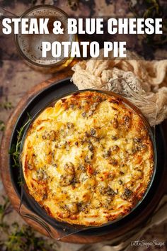 steak and blue cheese potato pie in a cast iron skillet with text overlay