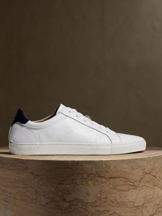 Banana Republic White Sneakers, White Leather Sneakers For Skateboarding, Mens White Leather Sneakers, White Leather Fade-resistant Sneakers, White Low-top Sneakers With Leather Trim, Thermal Comfort, Pure White, Minimal Design, White Sneaker