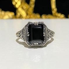 Sterling Silver Black Sapphire Ring....Marked 925...Total of weights 2.6grams... Size 8...Measure of Face 11.9MM...It's in very good condition. Classic Black Engraved Jewelry, Elegant Black Sterling Silver Engraved Ring, Elegant Black Engraved Sterling Silver Ring, Black Hallmarked Rings Fine Jewelry, Black Sterling Silver Rings For Anniversary, Black Sterling Silver Engraved Ring For Anniversary, Black Nickel-free Rings For Promise, Black Engraved Gemstone Ring For Anniversary, Black Gemstone Engraved Ring For Anniversary