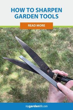 a person holding scissors in their hand with the text how to sharpen garden tools read more