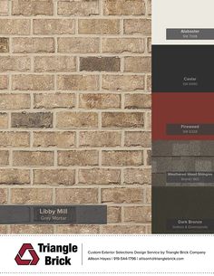 a brick wall that has different colors and finishes on it, including brown, black, red