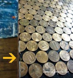 a pile of coins sitting on top of a table