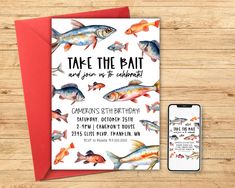 a birthday card with fish on it next to an iphone and red envelope that says, take the pat and you're hungry