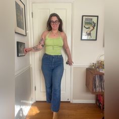 This Y2K halter top is a classic! Made of a minty green, it has a rounded ruched neckline and ties at the back of the neck.  Has two hanging ties that have gold buckles. Marked a size medium with measurements in photos- super stretchy! Made in the USA by flamingo. Good condition - no major flaws to note. Perfect for spring and summer and has a very 70s vibe! Retro Green Tank Top For Spring, Retro Fitted Tank Top For Spring, Spring Fitted Retro Halter Top, Fitted Retro Halter Top For Spring, Green Fitted Casual Halter Top, Fitted Green Halter Top Casual Style, Fitted Green Halter Top For Casual Wear, Y2k Halter Top, Green Halter Top