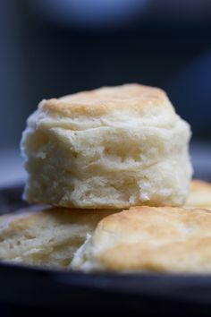 two biscuits sitting on top of a plate