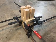 a couple of wooden blocks sitting on top of a machine