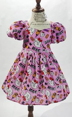 This style dress is so fun for the whole month of October! If you like treats this dress is for you.  Made of 100% cotton fabric. On the back for more comfort and flexibility in size, it has elastic at the waist and straps to make an adjustable bow .  Available in sizes 12M-5T-  If larger is needed please message me.  NOTE: Some of the sample dresses where photographed with a Petti skirt under the dress, TO SHOW SKIRT FULLNESS, (PETTISKIRT NOT INCLUDE) This dress is perfect for any occasion.  If Pink Dress For Halloween Dress-up, Cute Short Sleeve Dresses For Costume Party, Pink Short Sleeve Halloween Dress, Pink Short Sleeve Dress For Halloween, Kawaii Short Sleeve Costume Party Dress, Kawaii Short Sleeve Dress For Costume Party, Pink Short Sleeve Dress For Costume Party, Pink Kawaii Costume Dress, Kawaii Fitted Costume Dress