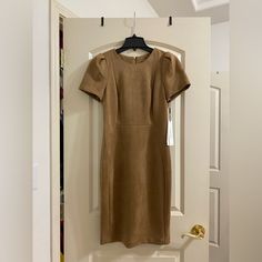 Brown/Tan Calvin Klein Knee Length Dress Original Msrp $129 Open To Offers Xoxo Fitted Neutral Midi Dress For Work, Neutral Fitted Short Sleeve Midi Dress, Fitted Short Sleeve Neutral Midi Dress, Fitted Neutral Midi Dress With Short Sleeves, Purple Velvet Dress, Sleeveless Shirt Dress, Sequin Midi Dress, Calvin Klein White, Business Casual Dresses