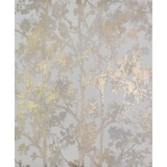 the wallpaper has gold and silver trees on it