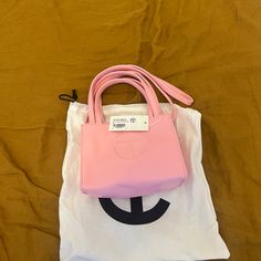 Brand New And Unworn, New With Tags. Measurements In Inches: 6.5 Inches X 4.5 Inches X 3.25 Inches 100 Authentic Baby Pink Telfar Bag, Telfar Bags, Telfar Handbags, Bubblegum Pink, Bubble Gum, Pink Color, Brand New, Handbags, Tags