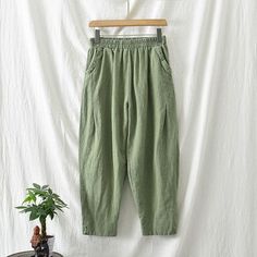 Material: 30%-50% Cotton, 30%-50% Linen Pattern: Solid Color Highlight: Pocket, Elastic Waist, Split Season: Spring, Summer, Autumn Spring Solid Color Baggy Pants, Spring Baggy Solid Color Pants, Baggy Solid Color Pants For Spring, Spring Solid Baggy Harem Pants, Spring Baggy Solid Color Harem Pants, Spring Baggy Solid Harem Pants, Fall Cotton Wide Leg Pants Solid Color, Fall Cotton Wide Leg Pants In Solid Color, Fall Wide Leg Cotton Pants In Solid Color