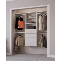 an open closet with clothes hanging on the wall and two drawers, one door opened