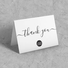 a thank card with the word thank you written on it