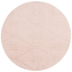 a round rug with dots on it in pink and beige colors, isolated against a white background