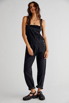 So essential and forever timeless overalls from our We The Free collection. **Fit:** Relaxed, slouchy silhouette **Features:** Bib-and-brace design, tapered legs, exaggerated bib pocket detail, rigid denim fabrication, varied distressing throughout **Why We | We The Free Ziggy Denim Overalls at Free People in Black, Size: L Overalls For Women, Overall Jumpsuit, Black Overalls, Trendy Denim, Tapered Leg Jeans, Jean Pants, Jumpsuit Pattern, Denim Romper, Classic Casual