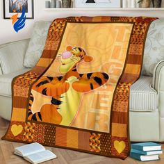 winnie the pooh blanket on a couch