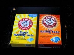 two boxes of baking soda sitting next to each other