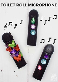 toilet roll microphones are decorated with colorful jewels and music notes on the top one