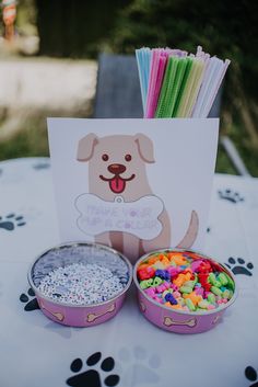 there is a table with two bowls of cereal and a sign that says thank you