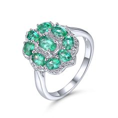 Limited time price. The round emerald stones are very clear, and the color is dark green. Very high-quality silver finish, it does not tarnish.  The diamond is SI1 clarity and G color. All out Emeralds originate from Zambia. Silver 3.80g. Emerald 1.867ct. Diamond 0.036ct. Size #8 Diamond Engagement Band, Bold Rings, Engagement Band, Emerald Engagement, Engagement Bands, Emerald Stone, Emerald Gemstone, Sterling Silver Bands, Birthstone Ring