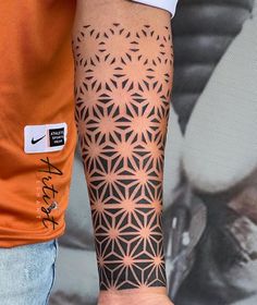 a person with a tattoo on their arm