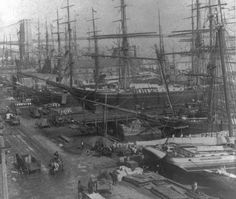 an old black and white photo of many ships