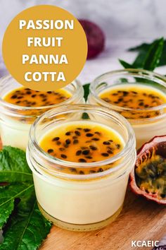 passion fruit panna cota in small glass jars on a cutting board with leaves