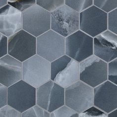 an abstract tile pattern with hexagonal tiles in grey and white colors, including one yellow object