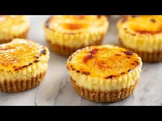 mini cheesecakes on a baking sheet ready to be baked in the oven for breakfast