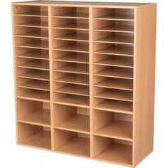 a large wooden bookcase with many compartments