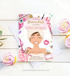 a birthday party with pink flowers and cupcakes