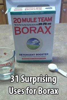 a box of borax sitting on top of a counter next to measuring cups